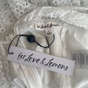White, V-neck dress with lace overlay